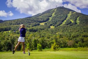 A person playing golf